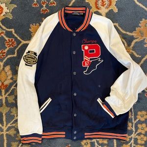 Polo Ralph Lauren blue & orange varsity jacket with patches and a bulldog on it.